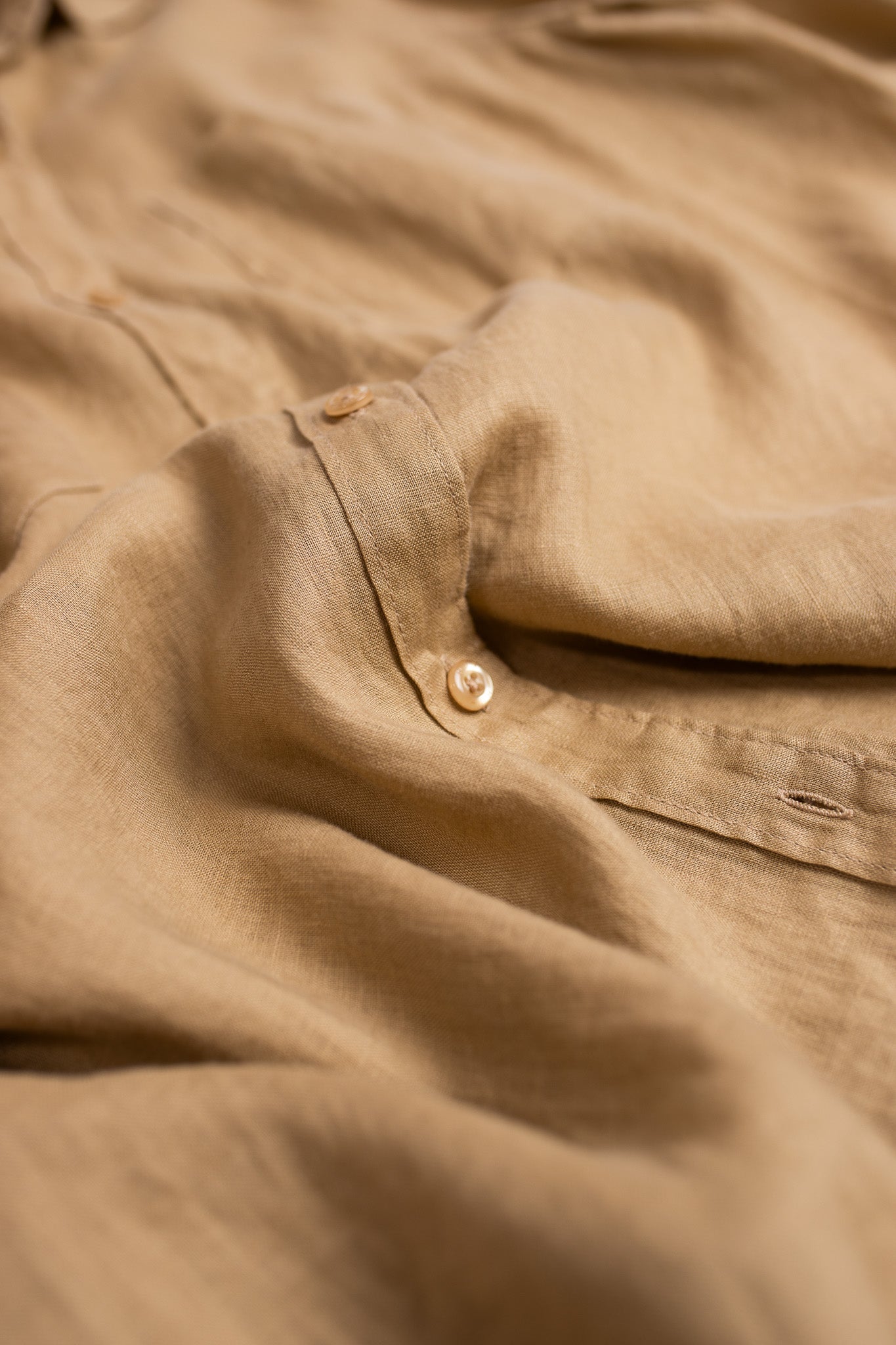 Close up of placket and buttons on Hut Clothing Croissant Boyfriend Linen Shirt