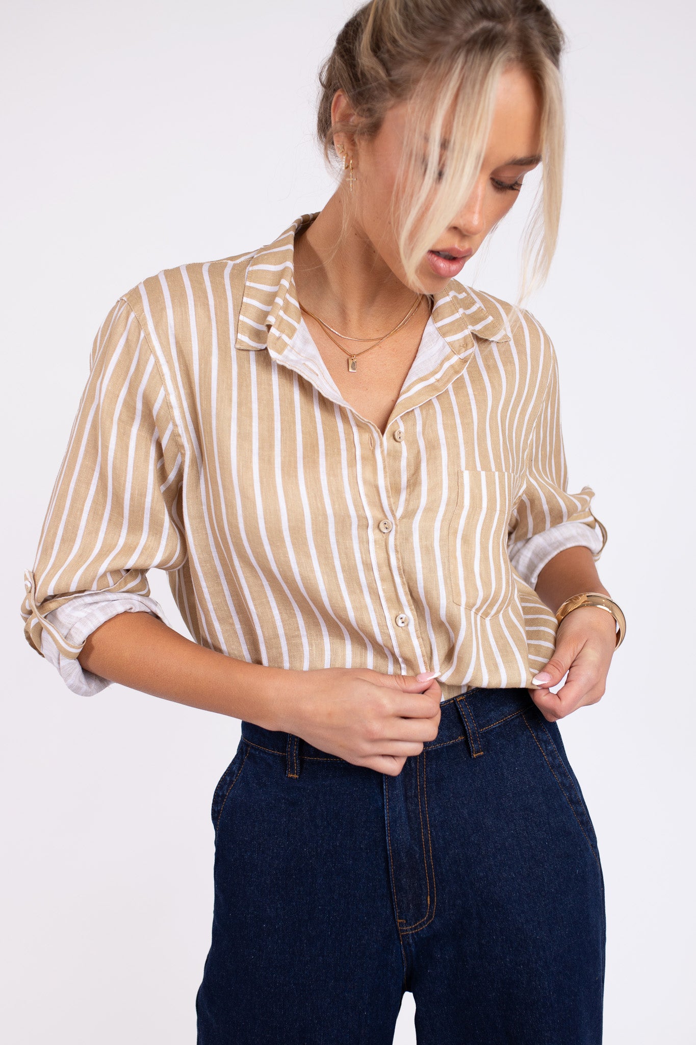 Model wearing Hut Clothing Iconic Tan Stripe Boyfriend Linen Stripe with one chest pocket and self covered buttons