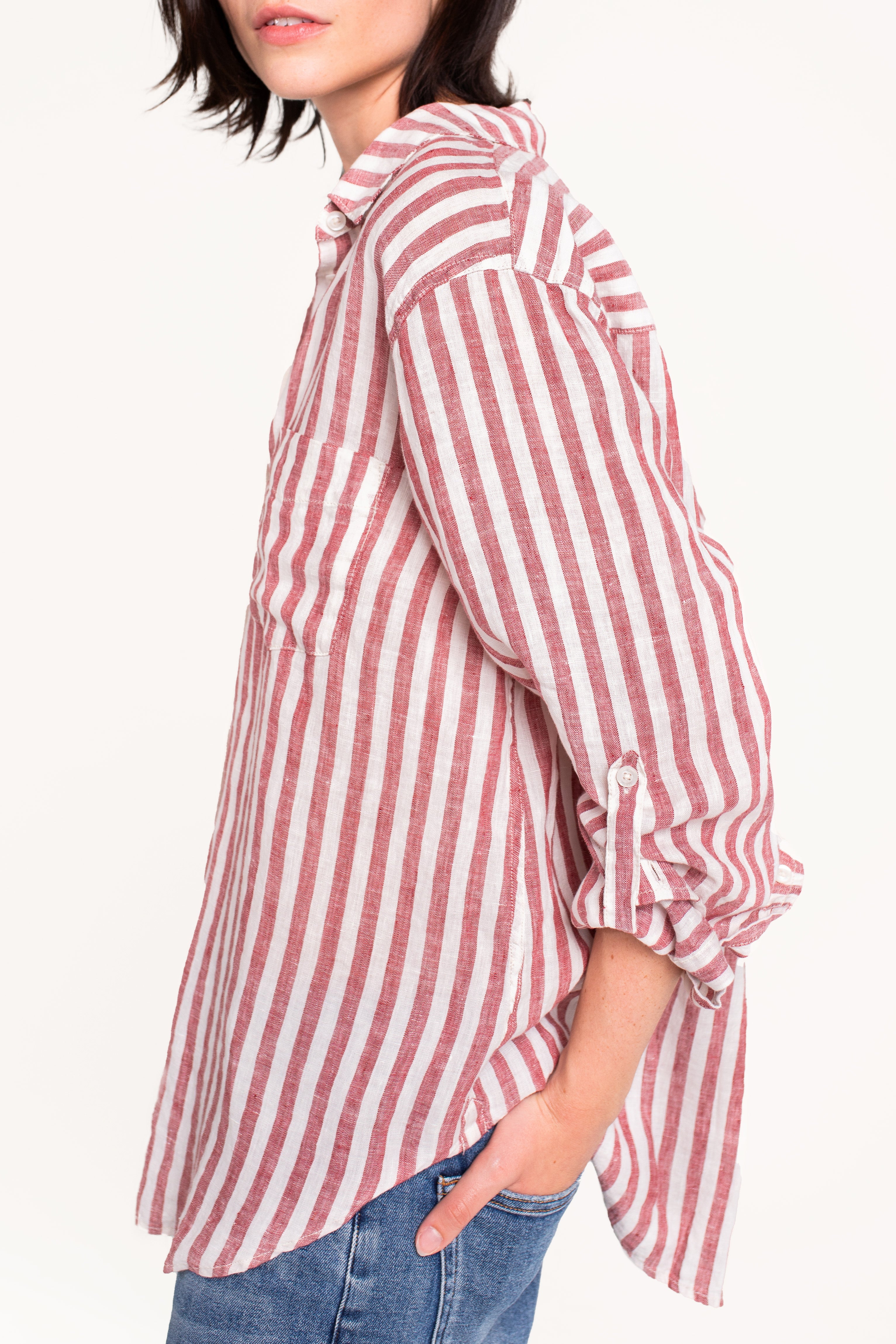 Side detail of Hut Rhubarb Stripe Boyfriend Linen Shirt featuring tab sleeves.