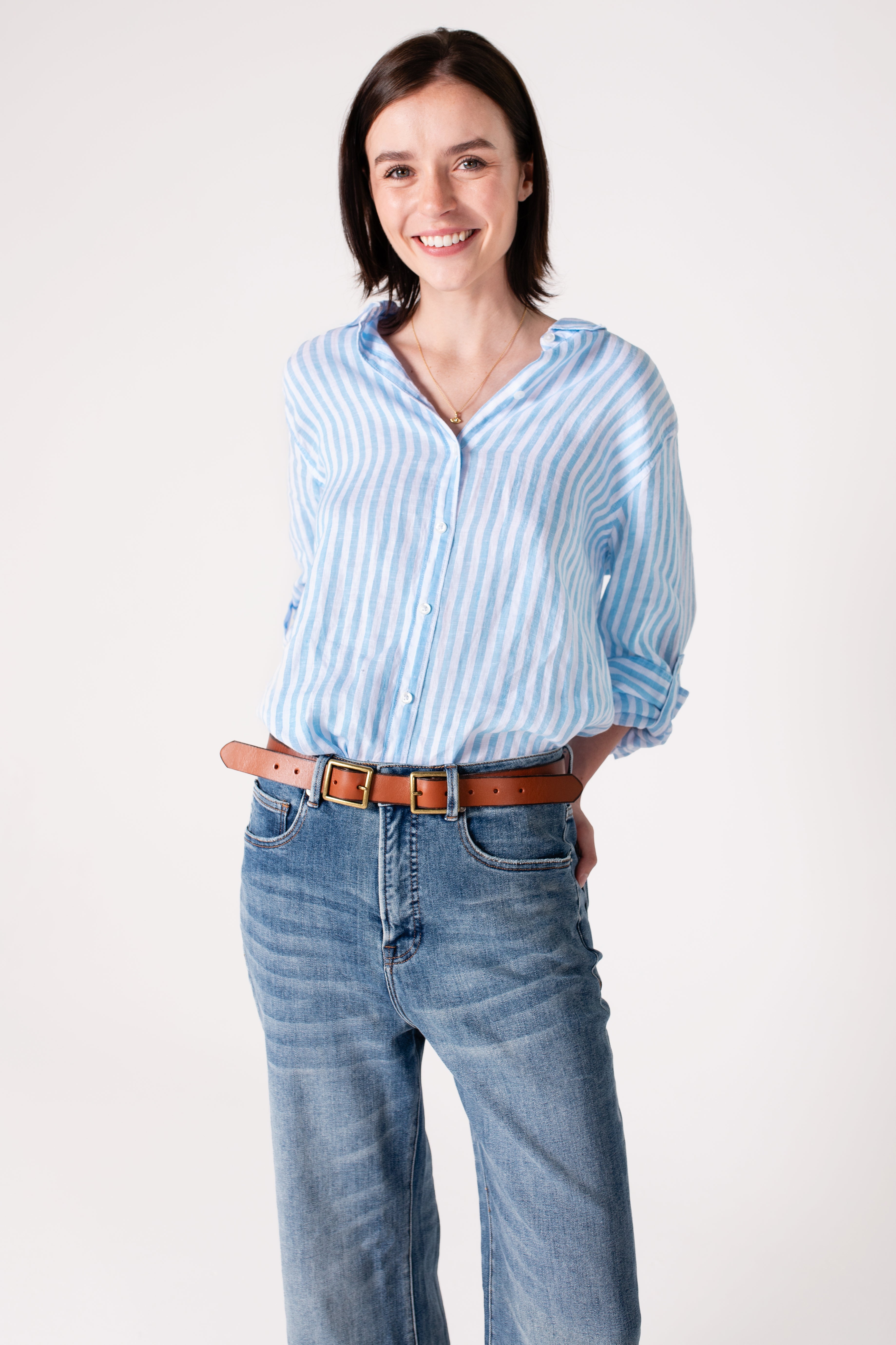 Model smiling wearing Hut Sky Blue Stripe Boyfriend Linen Shirt