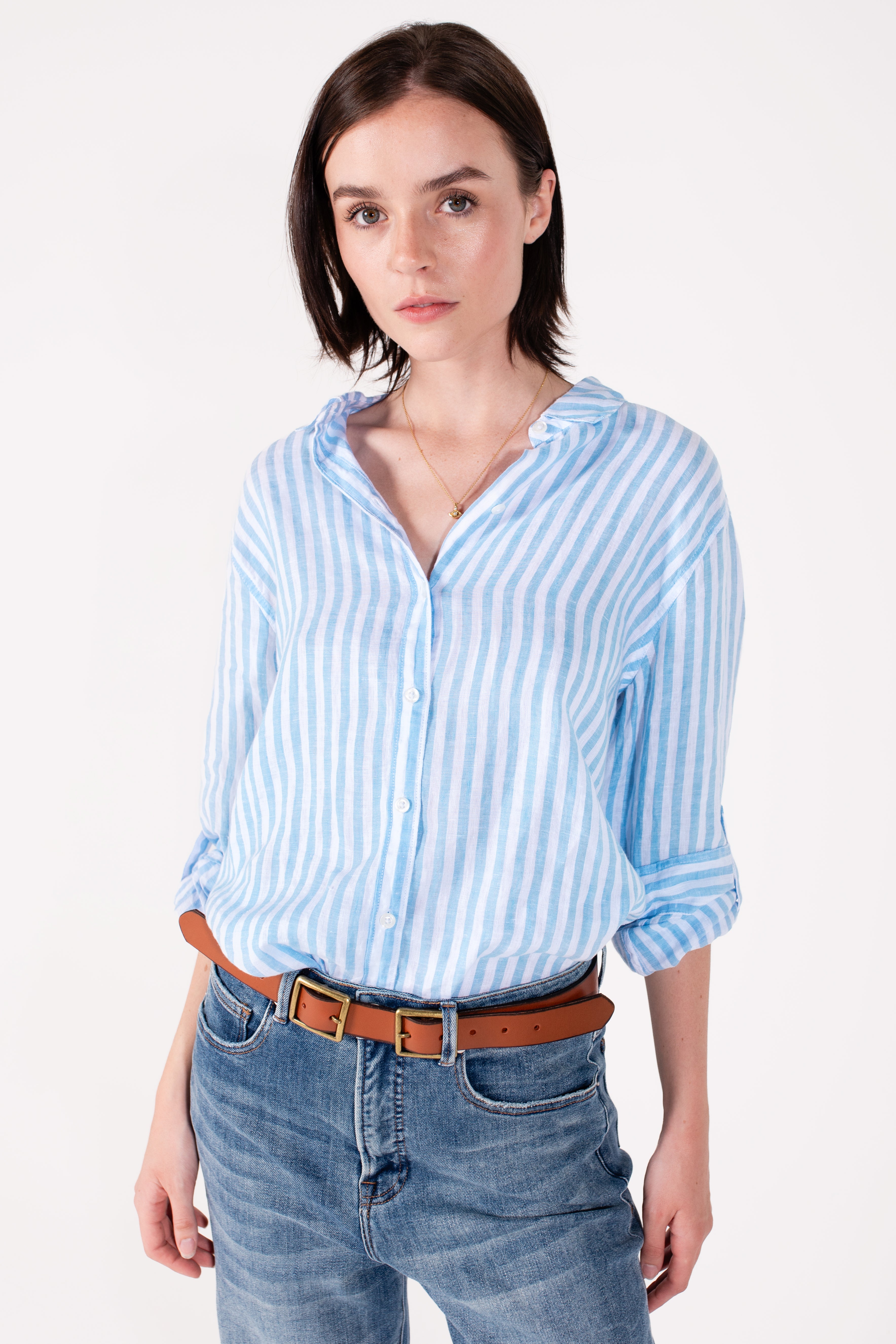 Model wearing Hut Sky Blue Stripe Boyfriend Linen Shirt with no chest pockets