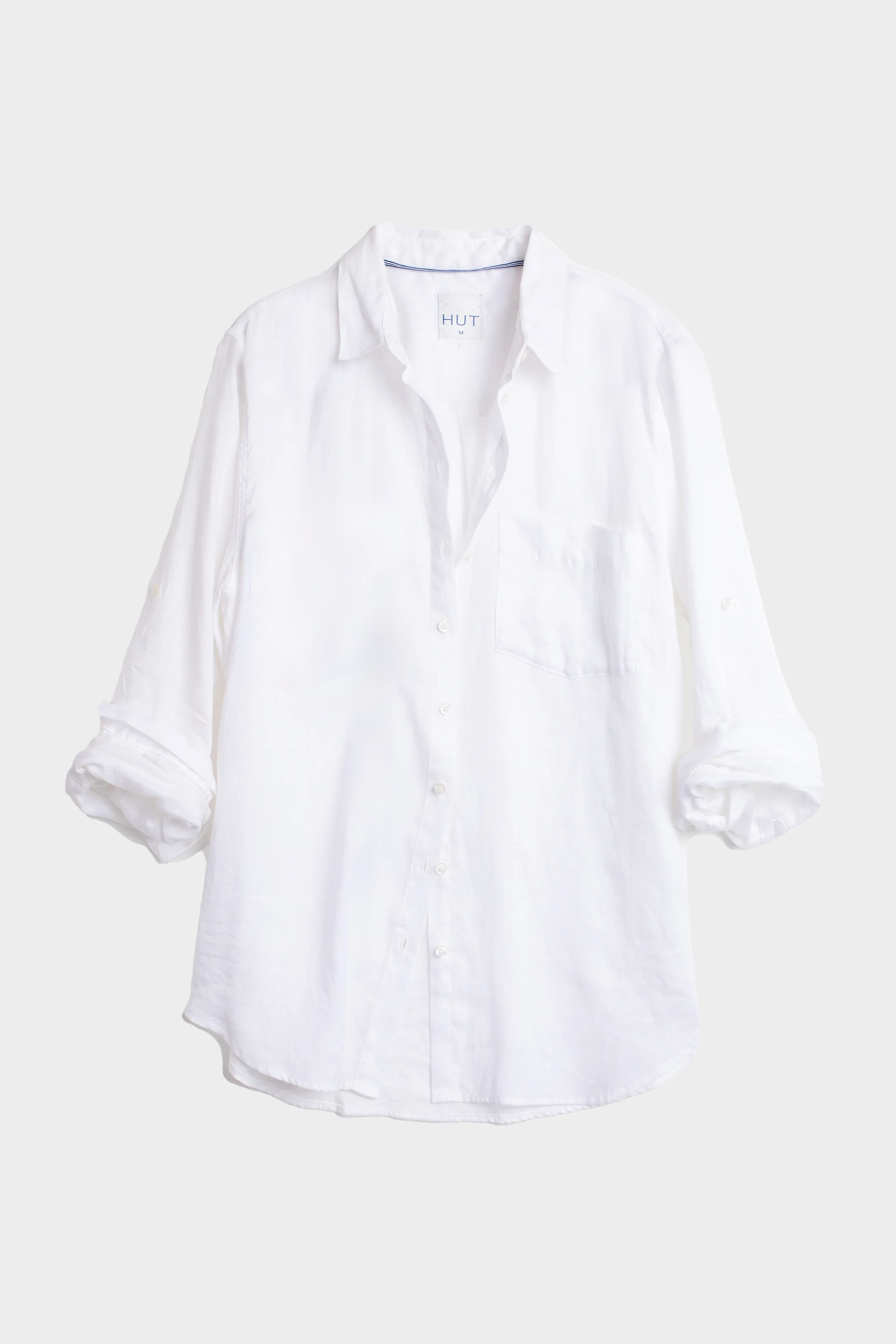 Hut White Oversized linen boyfriend shirt on a light gray background made from organic Belgian Linen with one chest pocket