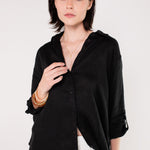 Model wearing Hut Black Embroidered Palm Boyfriend Linen Shirt with no pockets and sleeves rolled up