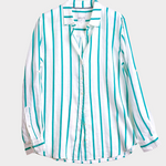Striped linen boyfriend shirt with turquoise stripe and white base on a light gray background
