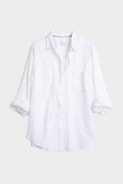 White linen boyfriend shirt on a light gray background
