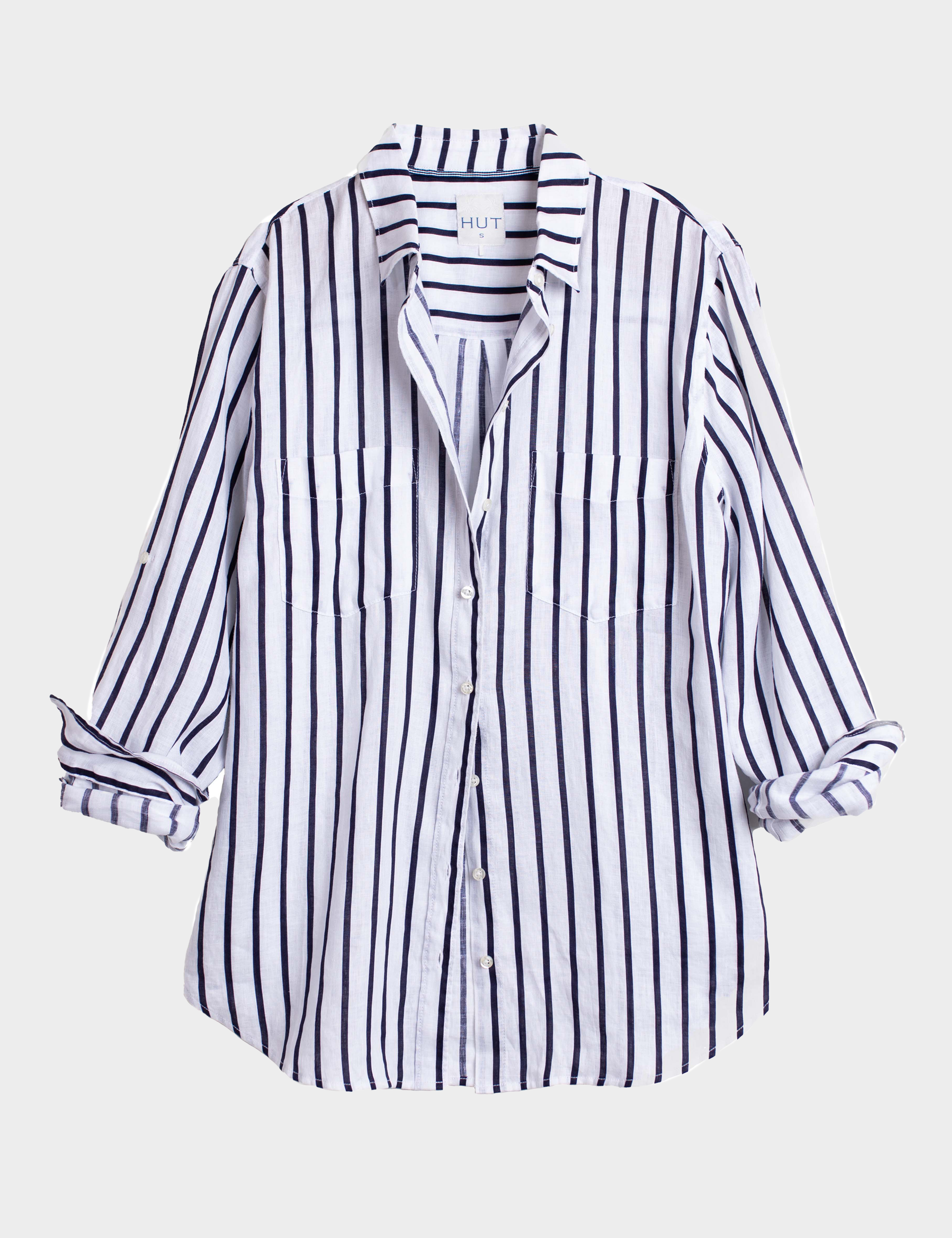 Navy and White Striped organic boyfriend linen shirt with two chest pockets and tab sleeves on a light gray background