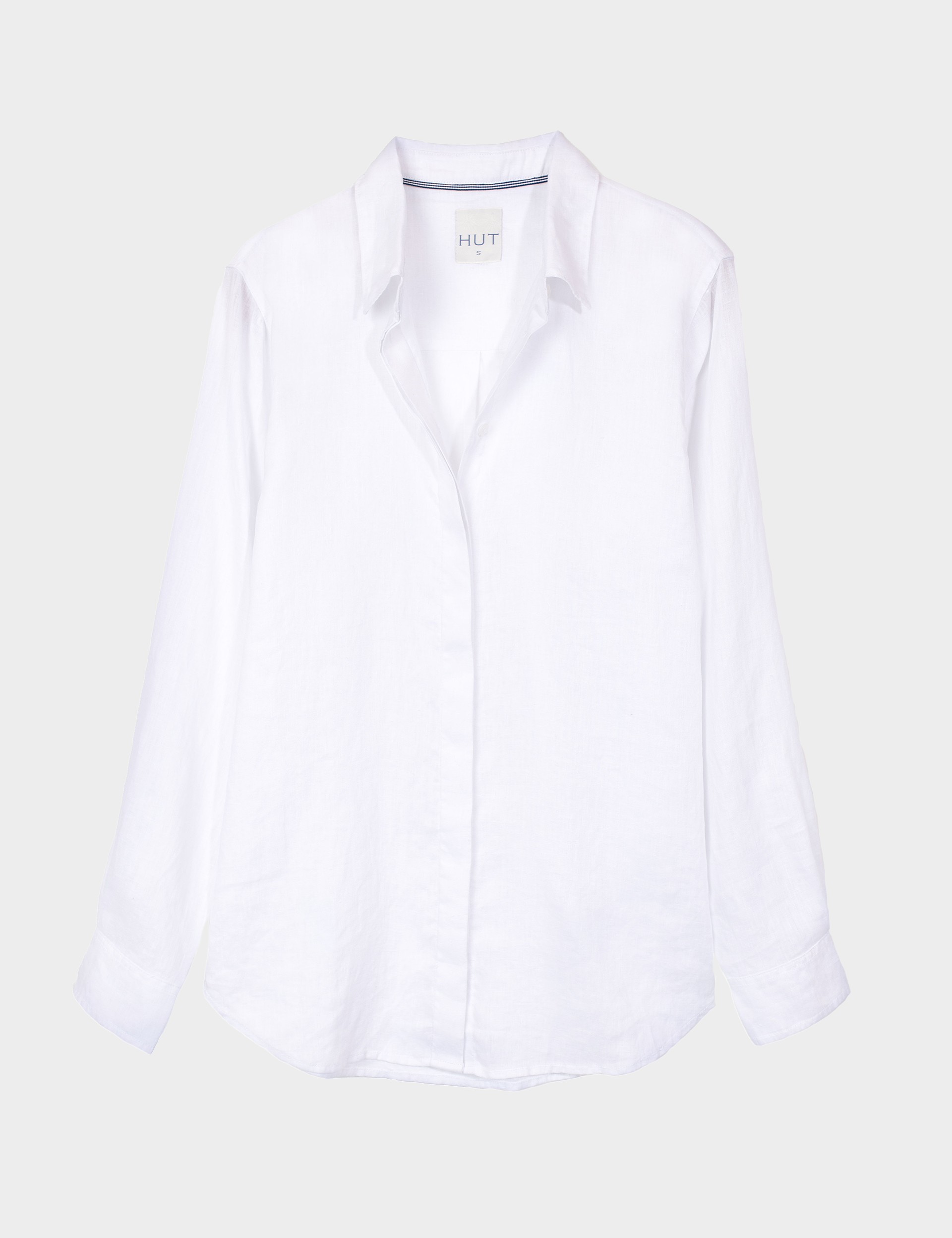 White hidden placket boyfriend linen shirt on a light gray background