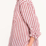 Side detail of Hut Rhubarb Stripe Boyfriend Linen Shirt featuring tab sleeves.