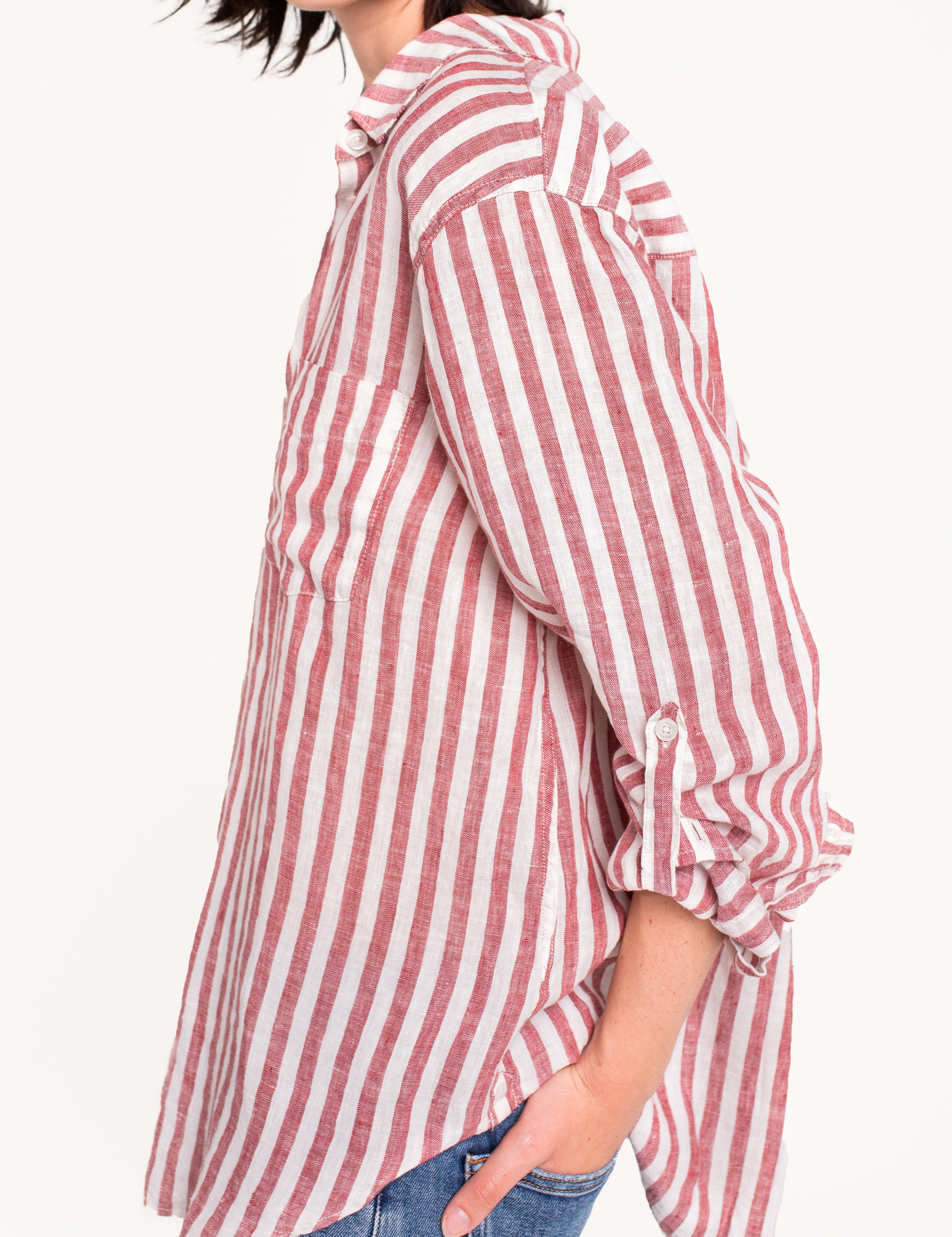 Side detail of Hut Rhubarb Stripe Boyfriend Linen Shirt featuring tab sleeves.