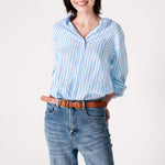 Model smiling wearing Hut Sky Blue Stripe Boyfriend Linen Shirt